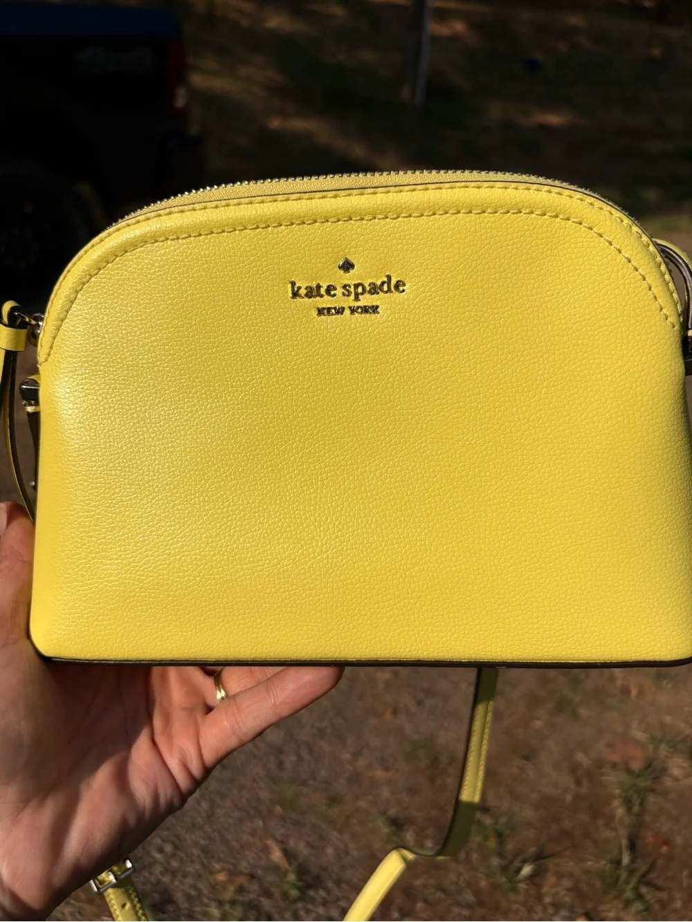 Kate Spade New York saffiano leather crossbody bag yellow